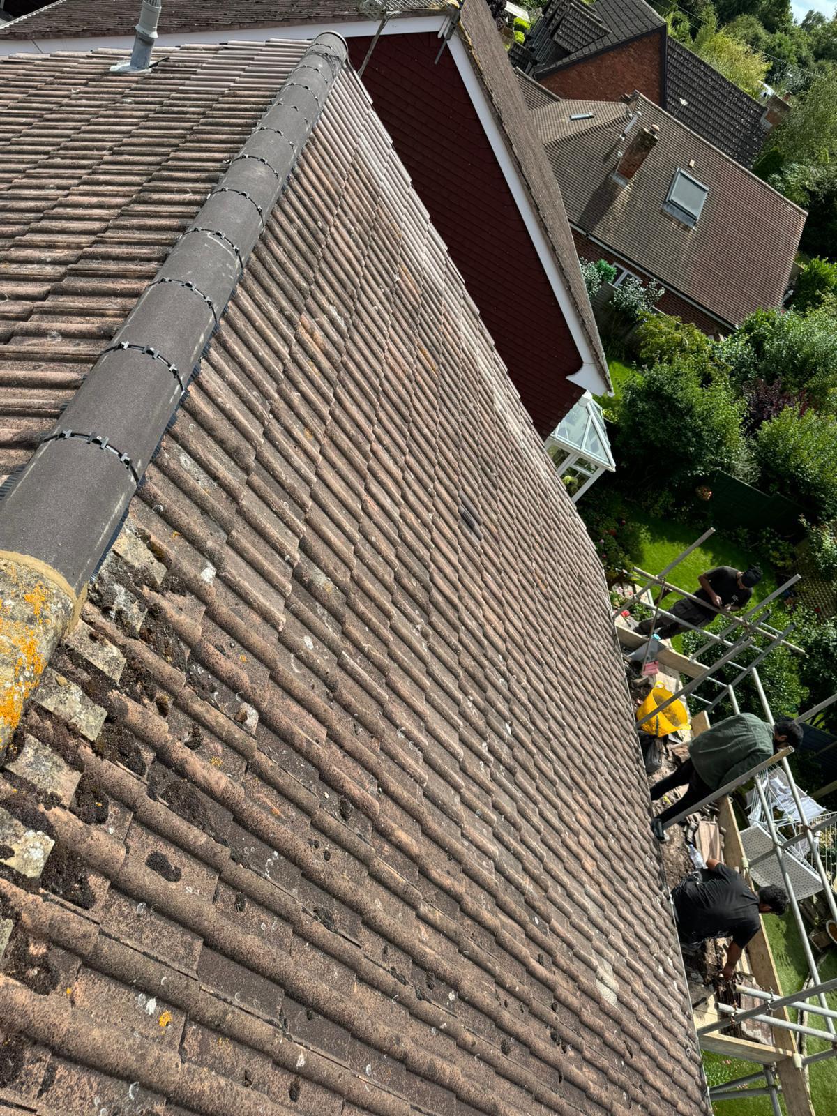 Moss-Damaged Roof Survey — roofing work in Dorset
