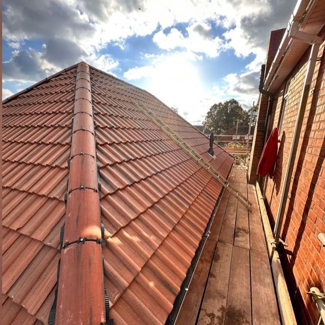 Full Tiled Re-roof — roofing work in Dorset