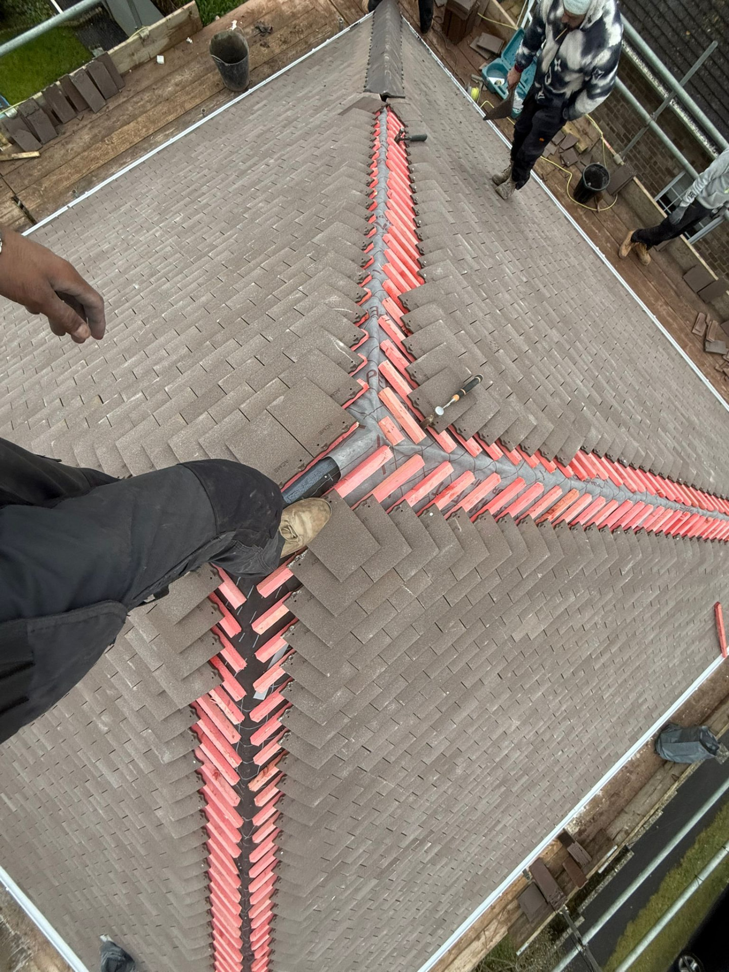 Hip & Ridge Tiling In Progress — roofing work in Dorset